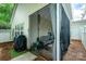 Cozy screened-in patio area with comfortable seating and exterior access at 4703 David Cox Rd, Charlotte, NC 28269