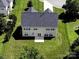 Aerial view of the back of the home and lawn at 4966 Riverview Dr, Harrisburg, NC 28075