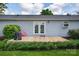 Backyard featuring a wooden deck, lawn, and light gray exterior at 5445 Creekwood Dr, Salisbury, NC 28147