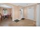 Bright breakfast area with a wood table and chairs near a doorway and an exterior door at 5445 Creekwood Dr, Salisbury, NC 28147