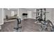 Finished basement gym with adjacent room and bathroom access at 6016 Graburns Ford Dr, Charlotte, NC 28269