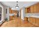 Kitchen with wooden cabinets, stainless appliances, eat-in area, and convenient desk space for added functionality at 6016 Graburns Ford Dr, Charlotte, NC 28269