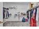 Walk-in closet with built in shelving and plenty of storage at 6016 Graburns Ford Dr, Charlotte, NC 28269