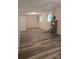 Spacious basement with new vinyl plank flooring and a hot water heater at 608 Sharon Dr, Statesville, NC 28625