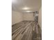Spacious basement with new vinyl plank flooring and a furnace at 608 Sharon Dr, Statesville, NC 28625