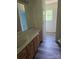 Bathroom with a vanity, sink, and a blue fiberglass tub at 608 Sharon Dr, Statesville, NC 28625