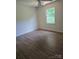 Bright bedroom with a window providing natural light and ceiling fan for added comfort at 608 Sharon Dr, Statesville, NC 28625