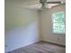 This bedroom features new wood floors and a ceiling fan at 608 Sharon Dr, Statesville, NC 28625