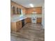 Traditional kitchen featuring wood cabinets, laminate countertops, and modern appliances at 608 Sharon Dr, Statesville, NC 28625