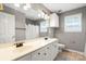 Bathroom featuring double sinks, tile flooring, a large mirror, and plenty of storage at 7151 Plough Dr, Mint Hill, NC 28227
