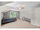 Large bedroom with unique ceiling and gray walls, offering ample space and natural light at 7151 Plough Dr, Mint Hill, NC 28227