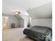Expansive bedroom with unique ceiling, featuring gray walls, and natural light at 7151 Plough Dr, Mint Hill, NC 28227