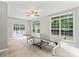 Spacious bonus room with a ping pong table, neutral walls, and carpet flooring, perfect for entertainment at 7151 Plough Dr, Mint Hill, NC 28227