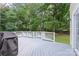 Spacious deck features custom railings and offers a great space for outdoor entertaining at 7151 Plough Dr, Mint Hill, NC 28227