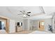 This airy main bedroom boasts a ceiling fan, carpet, neutral walls and provides entrance to main bath at 7151 Plough Dr, Mint Hill, NC 28227