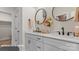 Bathroom features a double vanity, round mirrors, and modern fixtures at 732 Falling Oak Aly # 22, Huntersville, NC 28078