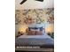 Inviting bedroom featuring a statement floral wallpaper and comfortable bedding at 732 Falling Oak Aly # 22, Huntersville, NC 28078