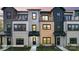 Charming townhome featuring modern design, brick accents, and a cozy balcony in a well-maintained neighborhood at 732 Falling Oak Aly # 22, Huntersville, NC 28078