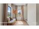 Bright living room featuring a window seat and large window for natural light at 732 Falling Oak Aly # 22, Huntersville, NC 28078
