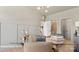 Stylish office with a glass top desk, modern lighting, and neutral wall paint at 732 Falling Oak Aly # 22, Huntersville, NC 28078