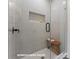 Modern shower with glass door, gray tiling, and built in shelf at 732 Falling Oak Aly # 22, Huntersville, NC 28078