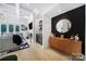 Bright living room with coffered ceilings, modern fireplace, and hardwood floors at 8016 Pemswood St, Charlotte, NC 28277