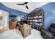 Comfortable home office featuring wood desk and shelves, office chair, and recessed lighting at 8016 Pemswood St, Charlotte, NC 28277
