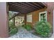 Backyard featuring brick exterior, walkway and landscaping at 8900 Cumbria Ct, Huntersville, NC 28078