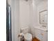 Stylish powder room with a vanity, sink, toilet, and gold-trimmed mirror, offering a convenient amenity at 8900 Cumbria Ct, Huntersville, NC 28078