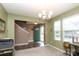 Inviting entryway featuring a green front door, wood floors, and neutral walls at 903 Von Buren Blvd, Rock Hill, SC 29730