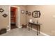 Hallway features a decorative table and mirror with an entrance to a bathroom at 903 Von Buren Blvd, Rock Hill, SC 29730