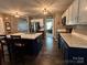 Well-lit kitchen featuring modern appliances, a central island with seating, and ample cabinet space at 903 Von Buren Blvd, Rock Hill, SC 29730