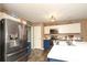 Modern kitchen features stainless steel appliances, and bright white countertops and cabinets at 903 Von Buren Blvd, Rock Hill, SC 29730