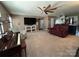 Spacious living room with open layout, neutral carpeting and views of kitchen and staircase at 903 Von Buren Blvd, Rock Hill, SC 29730