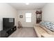 Cozy living room features plush carpeting, neutral walls, and comfortable seating at 903 Von Buren Blvd, Rock Hill, SC 29730