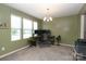 A bright and spacious office space featuring three windows and neutral carpet at 903 Von Buren Blvd, Rock Hill, SC 29730