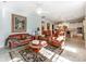 Spacious living room with fireplace, elegant furnishings, and seamless access to the kitchen area at 9730 White Frost Rd, Charlotte, NC 28277
