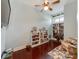 Bright home office features built-in bookshelves and hardwood floors at 9730 White Frost Rd, Charlotte, NC 28277