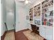 Bright office with built-in bookshelves, a desk, and hardwood floors at 9730 White Frost Rd, Charlotte, NC 28277