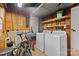 Unfinished basement with washer and dryer hookups, offering storage and utility space at 1024 Regency Dr, Charlotte, NC 28211