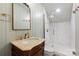 Elegant bathroom features vanity, glass-enclosed shower, and modern fixtures at 1024 Regency Dr, Charlotte, NC 28211