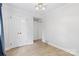 Neat bedroom with tiled floors, and closet space for ample storage at 1024 Regency Dr, Charlotte, NC 28211