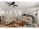 Bright living space open to kitchen and dining areas at 11031 Larkslea Ln, Charlotte, NC 28278