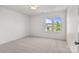 This carpeted room offers natural light, a double-hung window and ample space, great for relaxation at 2532 Blue Moss Dr, Dallas, NC 28034