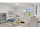 Bright, stylish ' bedroom features playful decor, a study area, and cozy sleeping nook at 2532 Blue Moss Dr, Dallas, NC 28034