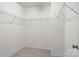 Walk-in closet features wire shelving, providing practical and spacious storage solutions at 2532 Blue Moss Dr, Dallas, NC 28034