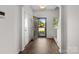 Bright entryway showcasing wood floors, an arched ceiling, and a view to the exterior at 2532 Blue Moss Dr, Dallas, NC 28034