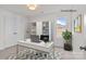 This virtually staged office features a modern desk, neutral carpet, and ample natural light at 2532 Blue Moss Dr, Dallas, NC 28034