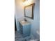 Bathroom featuring gray vanity with marble countertops, updated fixtures and marble tile floor at 258 Lincoln Sw St, Concord, NC 28025