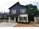 Stylish two-story home with a sleek, modern design and a covered front entrance at 258 Lincoln Sw St, Concord, NC 28025